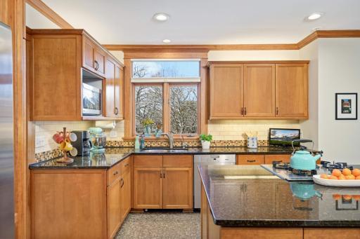 Photo for 4332 Fremont Avenue S, Minneapolis, MN 55409 - Listing #6469121 Glance at the lake from the kitchen window