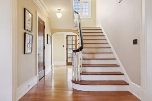 Phenomenal center hall staircase layout allows for wonderful flow throughout the home