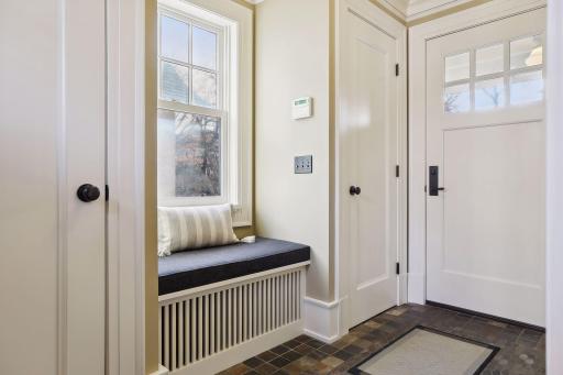 Wonderful addition of a mudroom makes access to the garage a breeze and storage a non factor