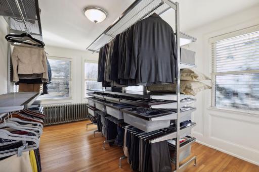 Large walk-in closet has ample storage for all of your clothing needs!