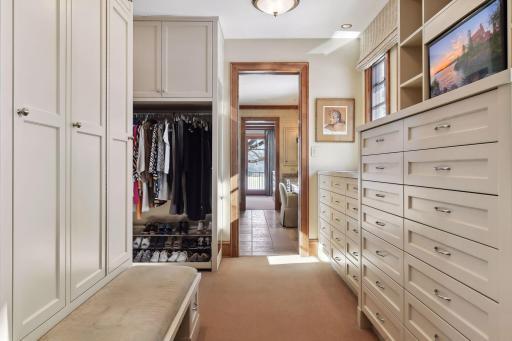 Walk-in closet with great storage and built-ins.
