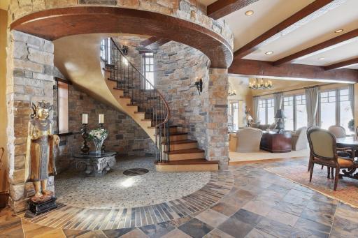 Walk in and observe beautiful stone and mill work throughout the home.