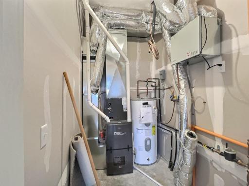 The mechanical room is accessed through the garage.