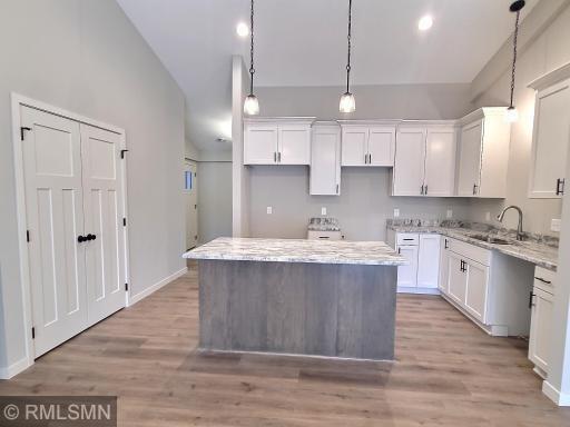 Beautiful kitchen area and the center island is great kitchen work station. Soft close for the drawers and cabinets.