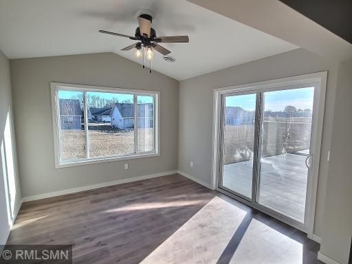 The sunroom on the back side of the home will offer great spot to enjoy reading a book and will walk out to a large patio to entertain on.
