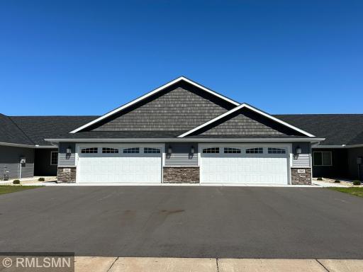 This unit is ready for its new owner. The one level units are located in prime location just off Highway 55 so easy access to town or a quick trip to the metro. Lawn care and snow removal is a part of the association fee.