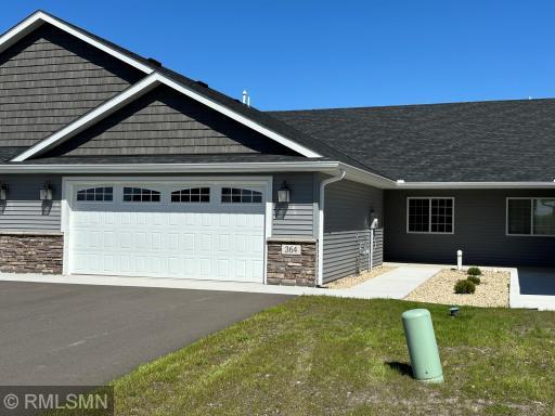 The landscaping is completed. The walkway to your front covered porch and entry. Welcome your friends and neighbors.