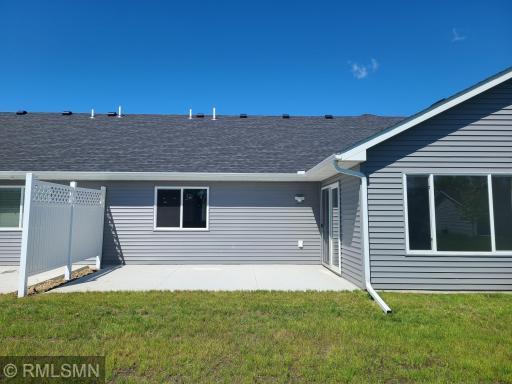Spacious rear patio ready for you to enjoy the great outdoors. Great entertaining area and walks out from the sunroom.