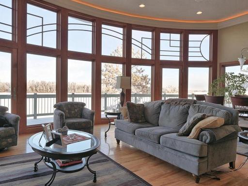 Floor to ceiling windows in the living room and dining area