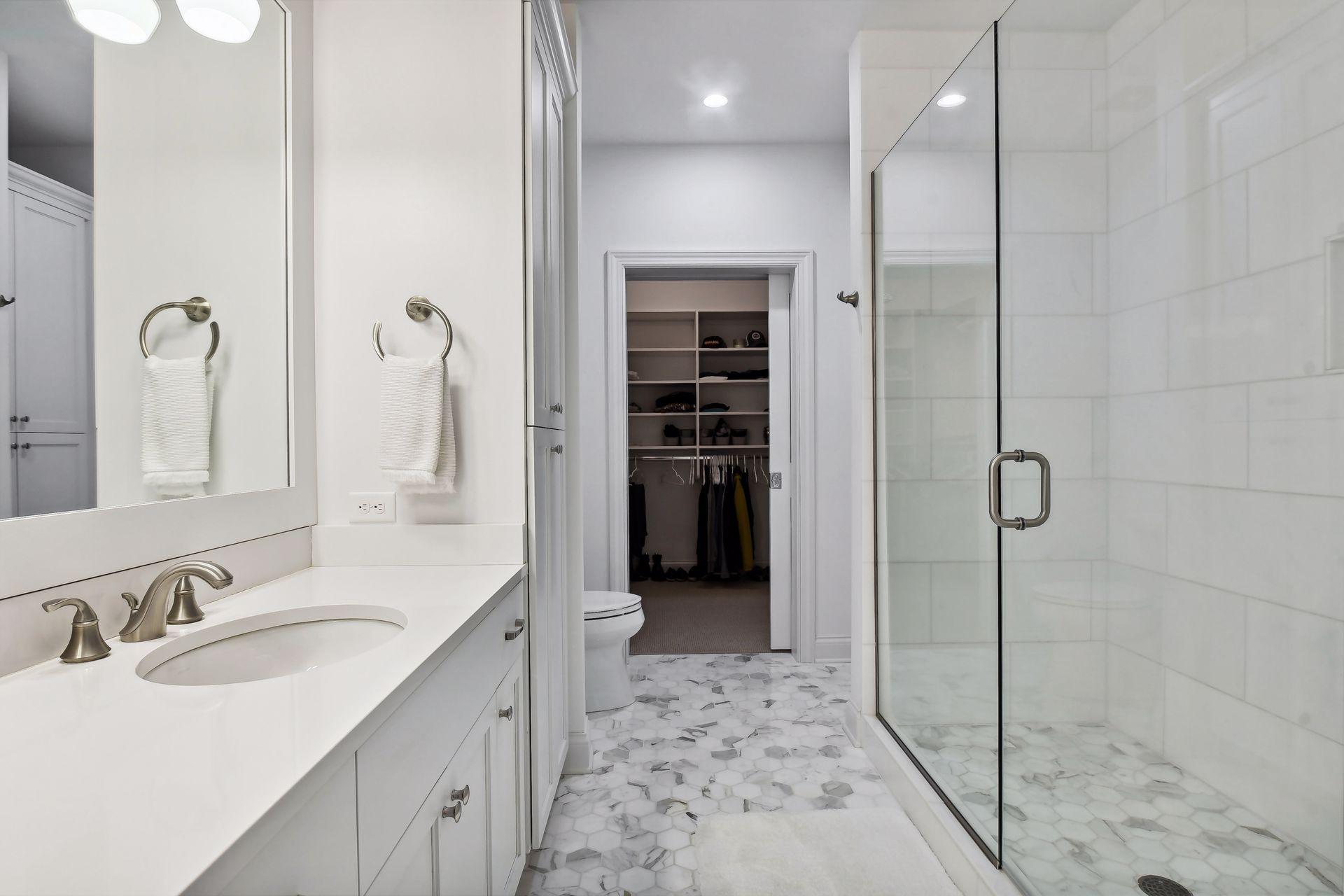 Primary bath offers a large walk-in shower