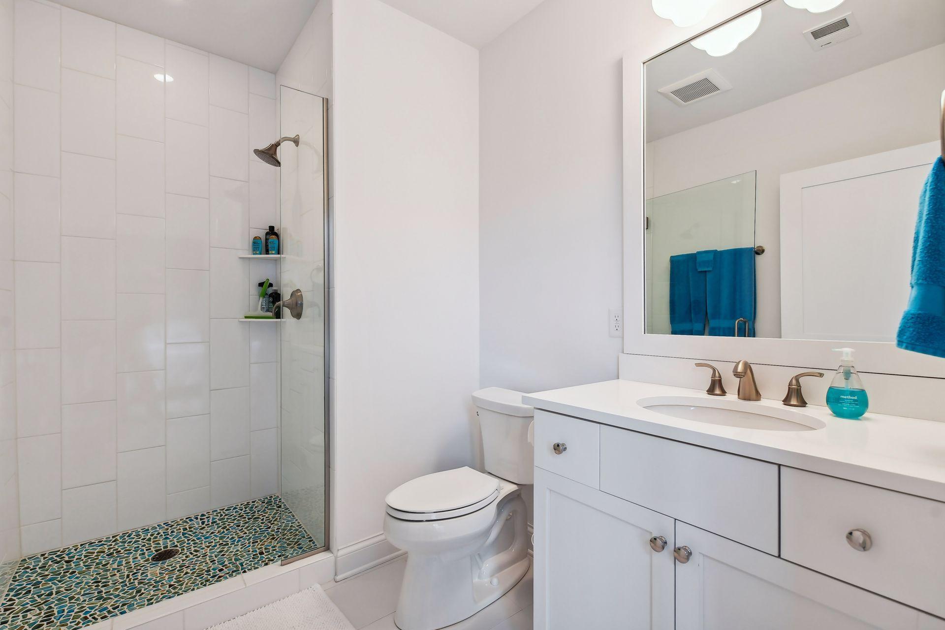 Secondary bedroom offers an en-suite 3/4 bath