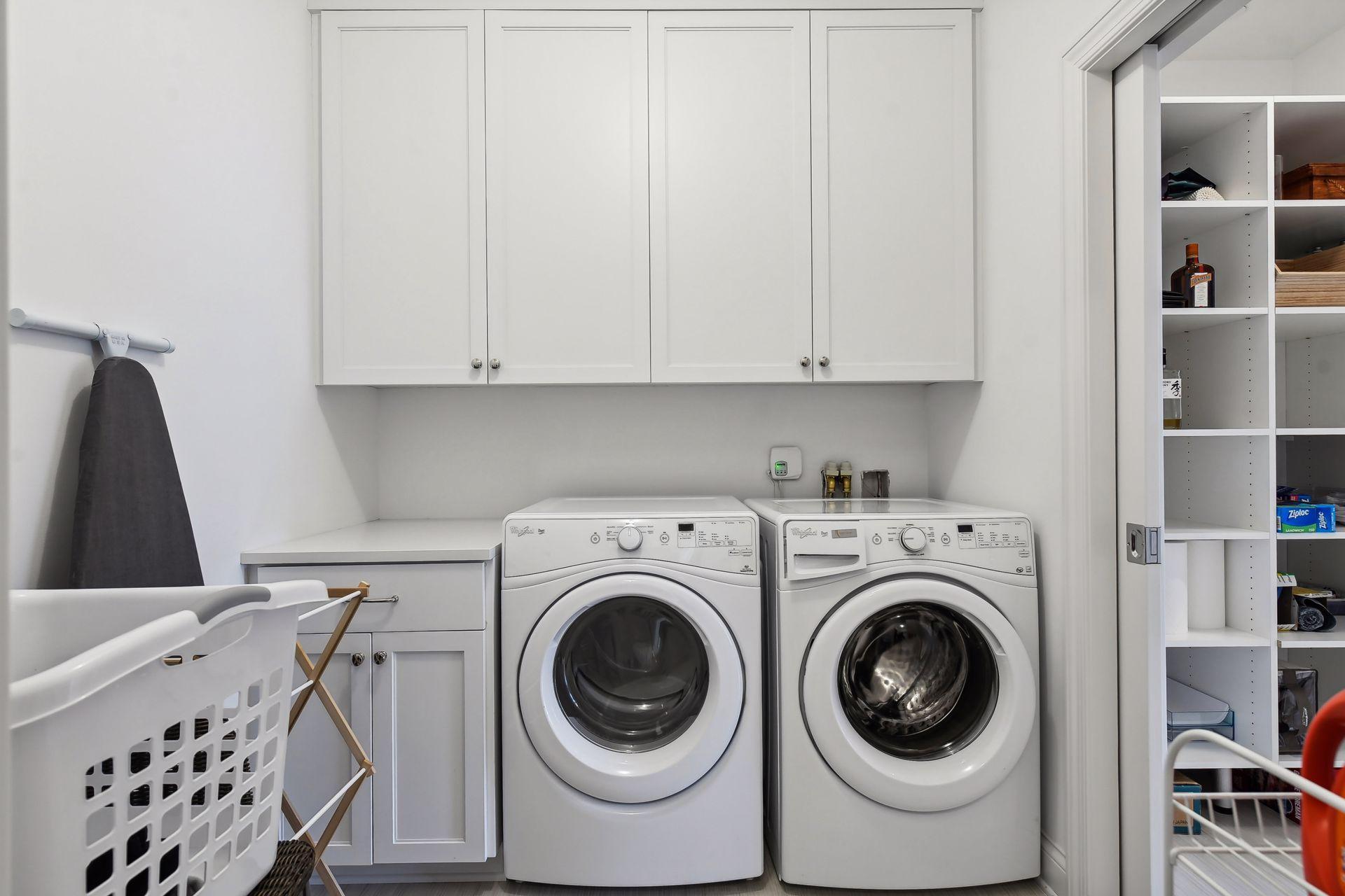 Laundry room is conveniently located next to the primary bedroom and closet