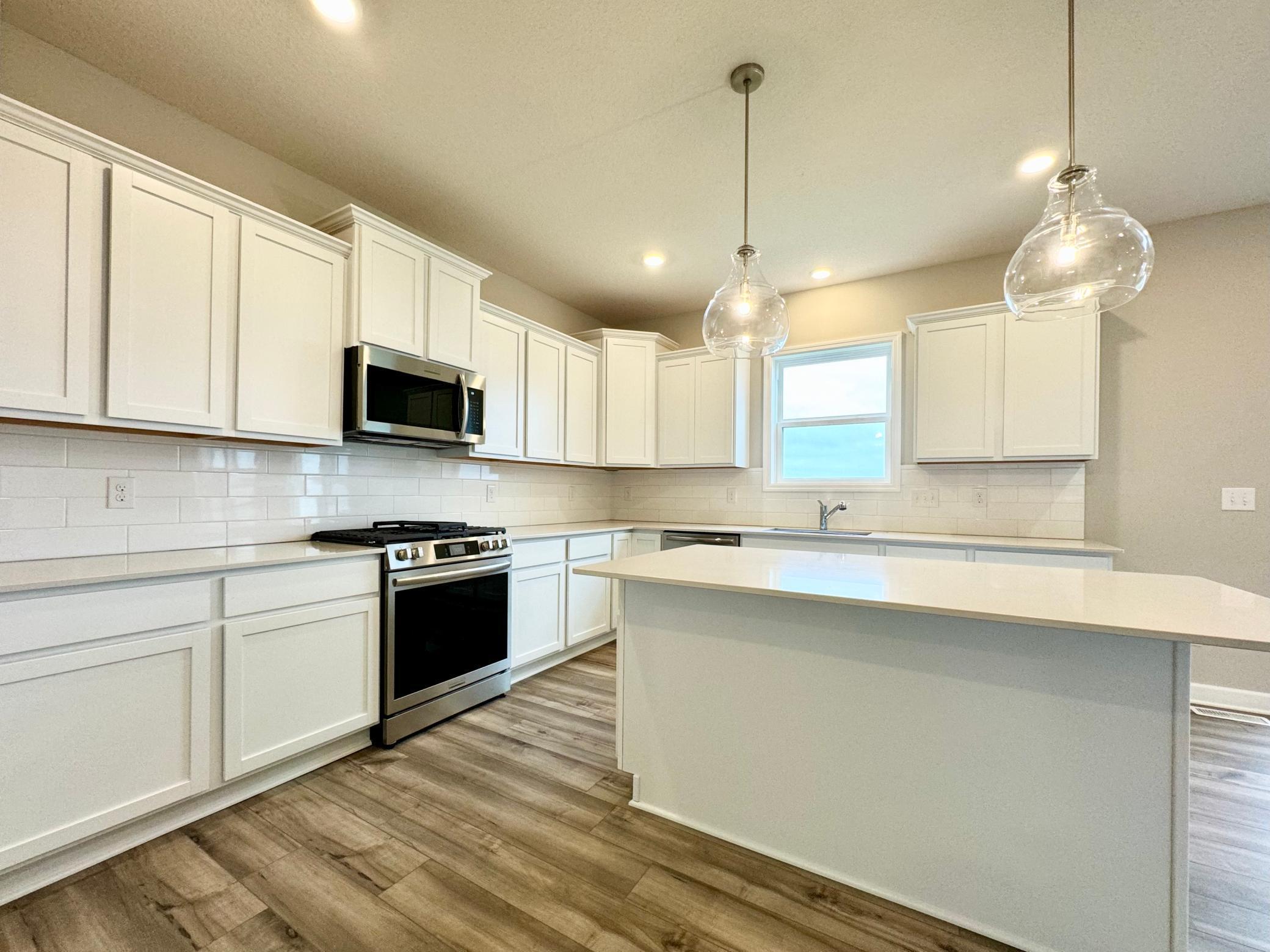 With plenty of cabinets and counterspace, you will feel at home in the Lewis! Photos of similar home, actual colors and finishes may vary.