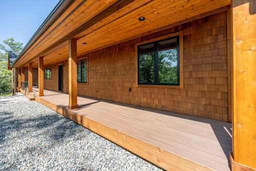 Covered porch overlooking the pond that invites wildlife viewing..jpg