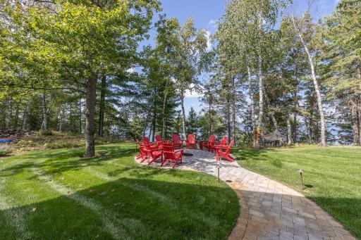 Outdoor paved firepit with long lake views â extensive landscaping including irrigation system..jpg