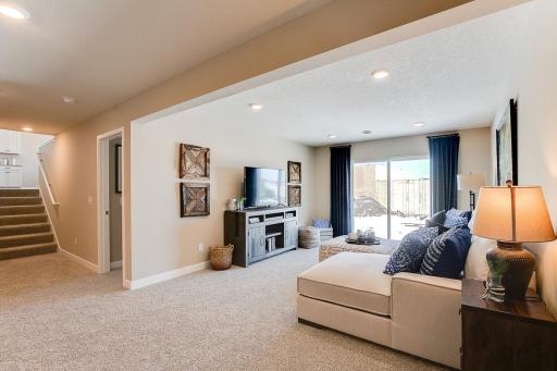 Photo for 12046 71st Street NE, Otsego, MN 55330 - Listing #6472526 The lower level family room - comes FINISHED! Model home photo, colors and selections may vary.