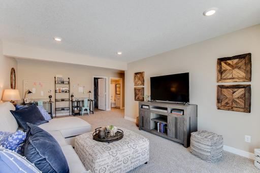Photo for 12046 71st Street NE, Otsego, MN 55330 - Listing #6472526 The lower level family room - comes FINISHED! Model home photo, colors and selections may vary.