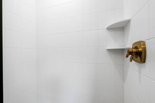 Floor to Ceiling Tiled Shower in Primary Suite
