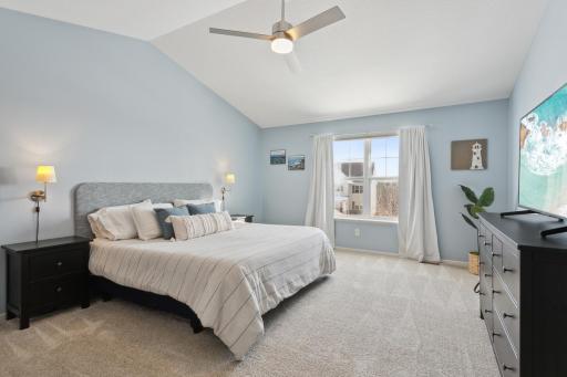 Primary suite features vaulted ceiling, walk in closet, and full bathroom with separate walk in shower and jet tub. Also has an accessory closet seprate from walk in closet for more storage.