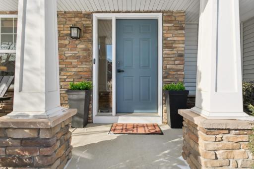 Poured concrete covered front porch