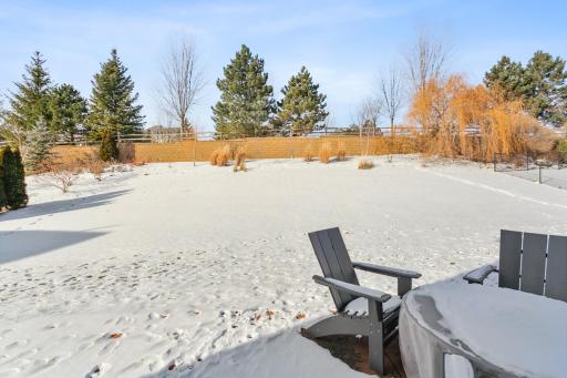 Great backyard space with stamped concrete patio!