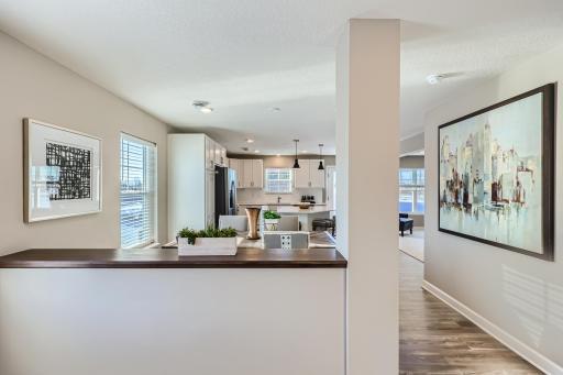 Notice the natural flow of light in this well-designed floor plan. (Photo of decorated model, actual home finishes may vary slightly)