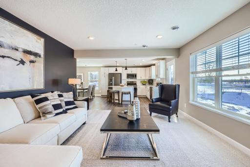 Cozy and contemporary perfectly describes the main level Great Room! (Photo of decorated model, actual home finishes may vary slightly)