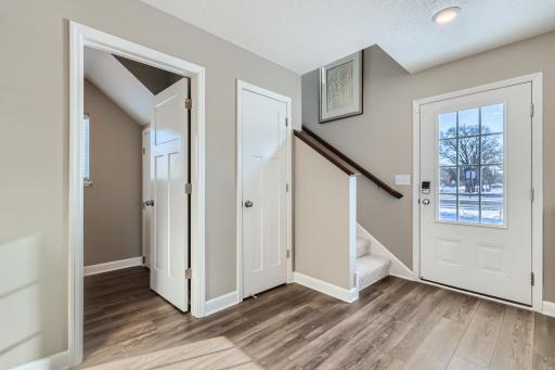 As always, first impressions matter. This welcoming and open foyer will help make a lasting one! (Photo of decorated model, actual home finishes may vary slightly)