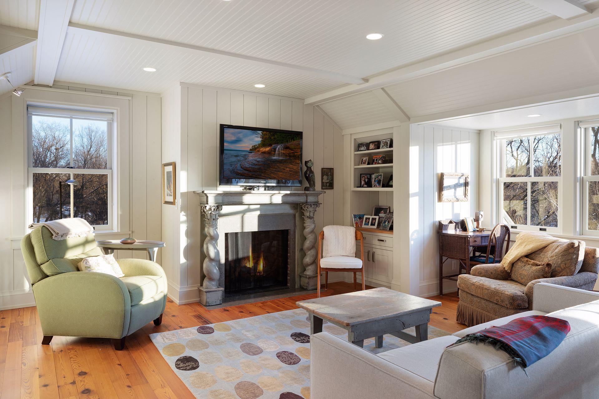 Nice living room area with a fireplace and views.