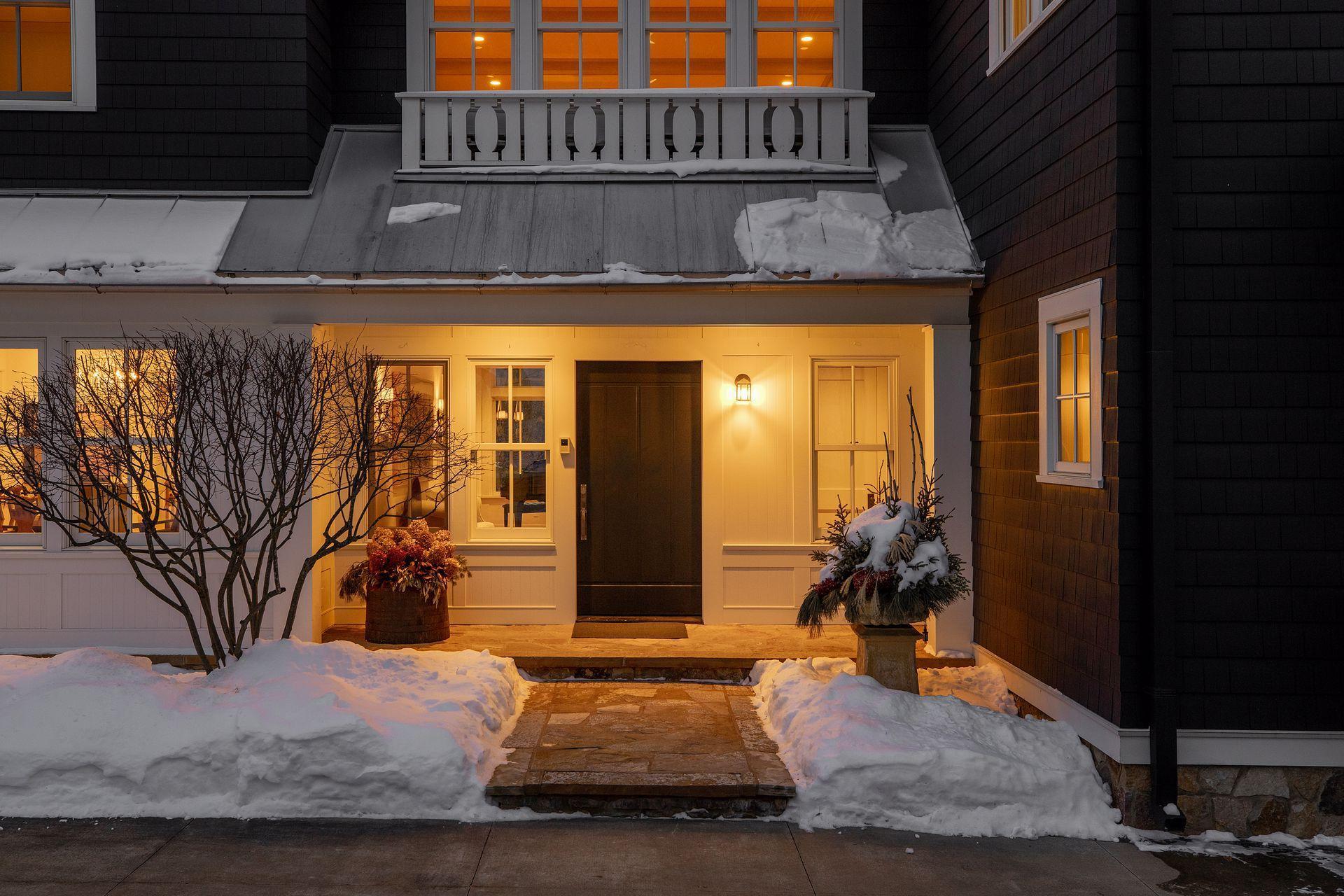 The "Modern Farmhouse" style of architecture creates a naturally warm entry.