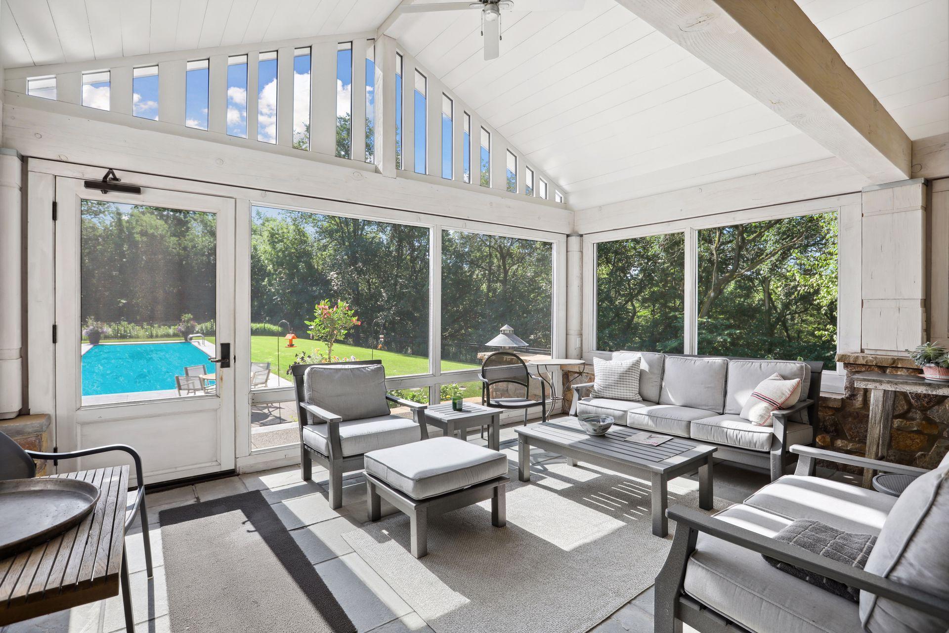 And the second screen porch off the living room has a fireplace to extend the enjoyment.