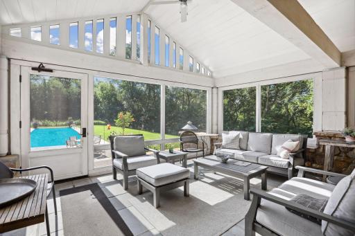 And the second screen porch off the living room has a fireplace to extend the enjoyment.