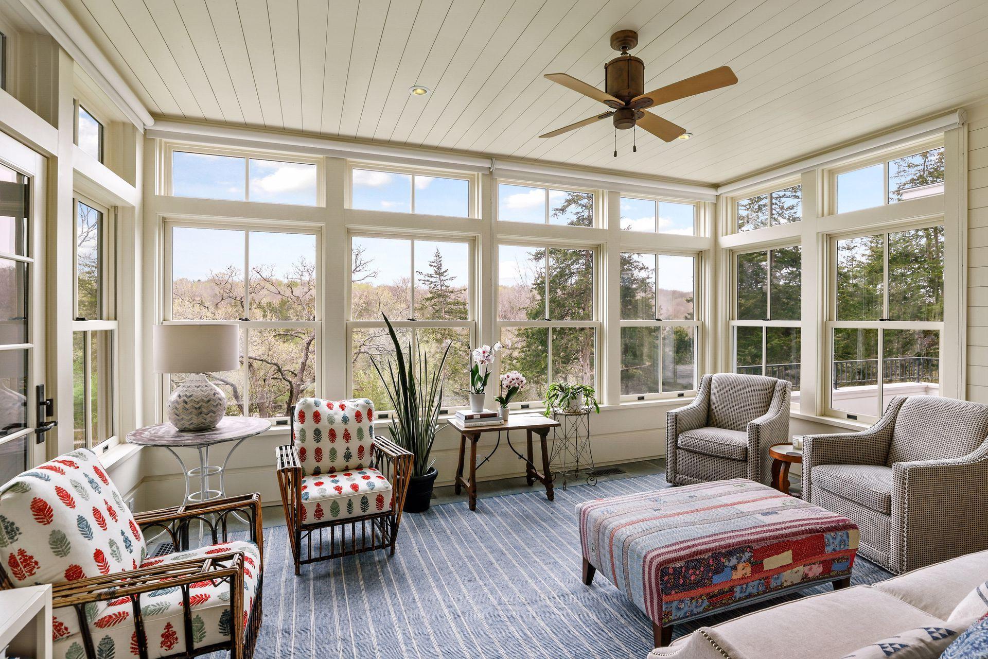 Bonus spaces on the main level include this four season "porch".