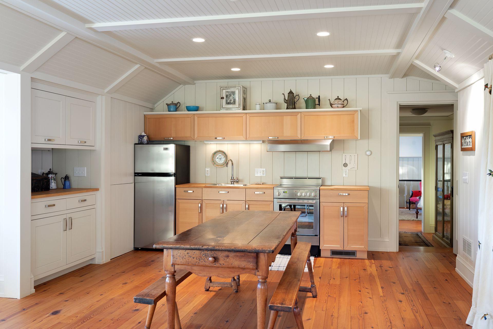 A complete kitchen and dining area.