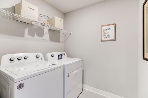 Life's simple pleasures - this one in the form of upper level laundry, just steps from each of the home's upper level bedroom!! Photo of model home, color & options may vary.
