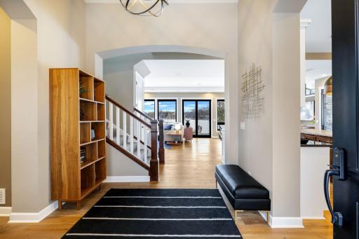 Spacious foyer greets you at the front door with expansive lake views from nearly every room