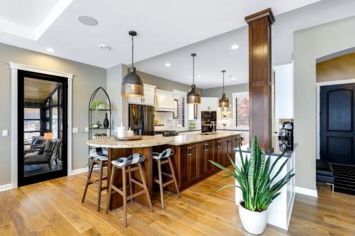This large kitchen is an entertainers dream with an abundance of storage, walk-in pantry and large center island