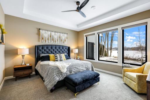 Main level primary suite with try vaulted ceiling