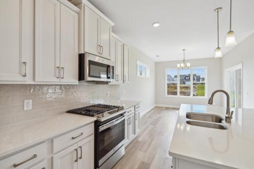 Just FINISHED! This is beautiful designer floorplan! This home is a MUST SEE! This villa home is luxury at its best. The FREEDOM LIVING LIFESTYLE that everyone craves! Discover why everyone wants to live here & why these homes are selling fast!