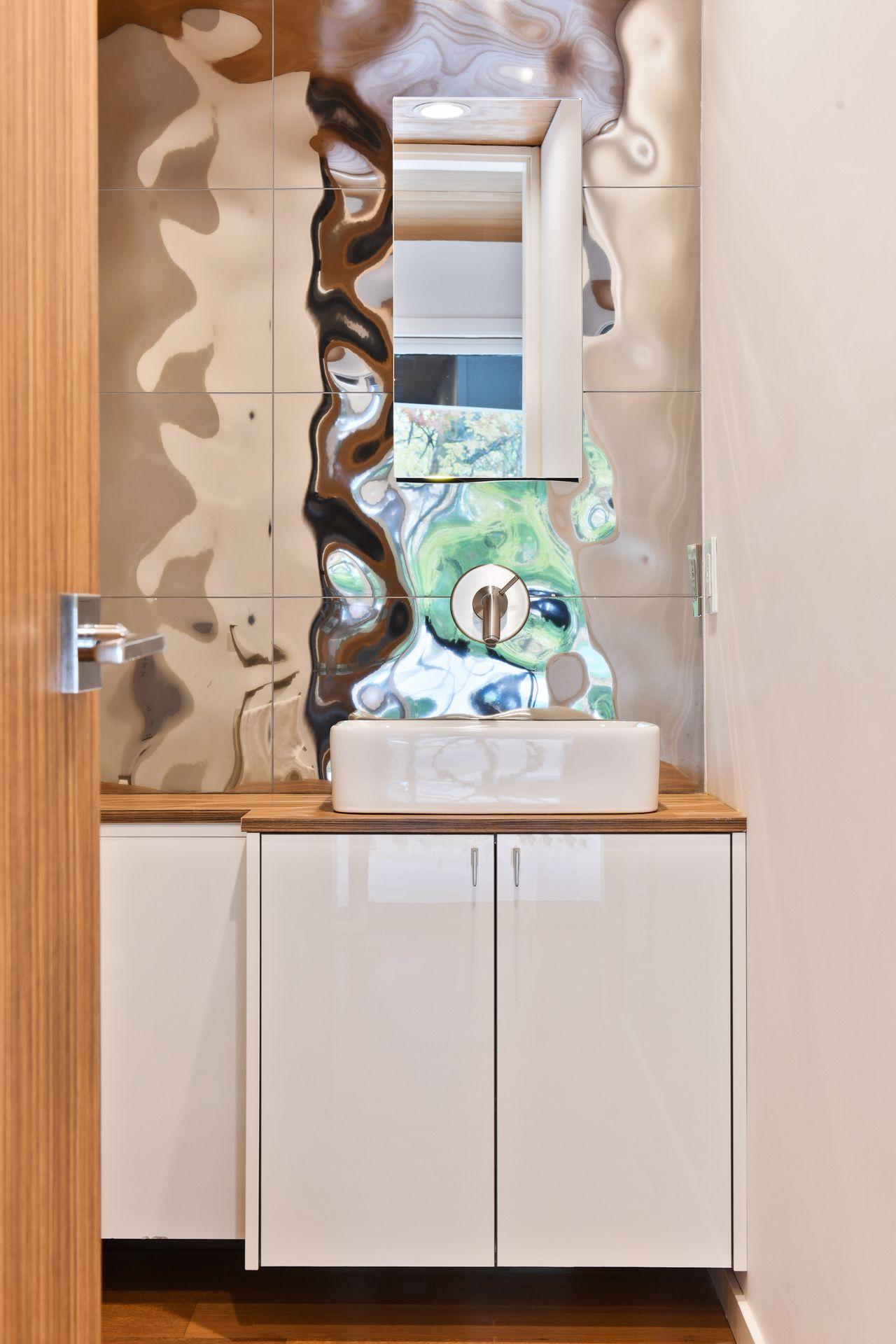 KWC Faucet, TOTO Neorest with Bidet and heated seat, Reflective multidimensional wall