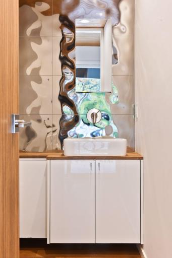 KWC Faucet, TOTO Neorest with Bidet and heated seat, Reflective multidimensional wall
