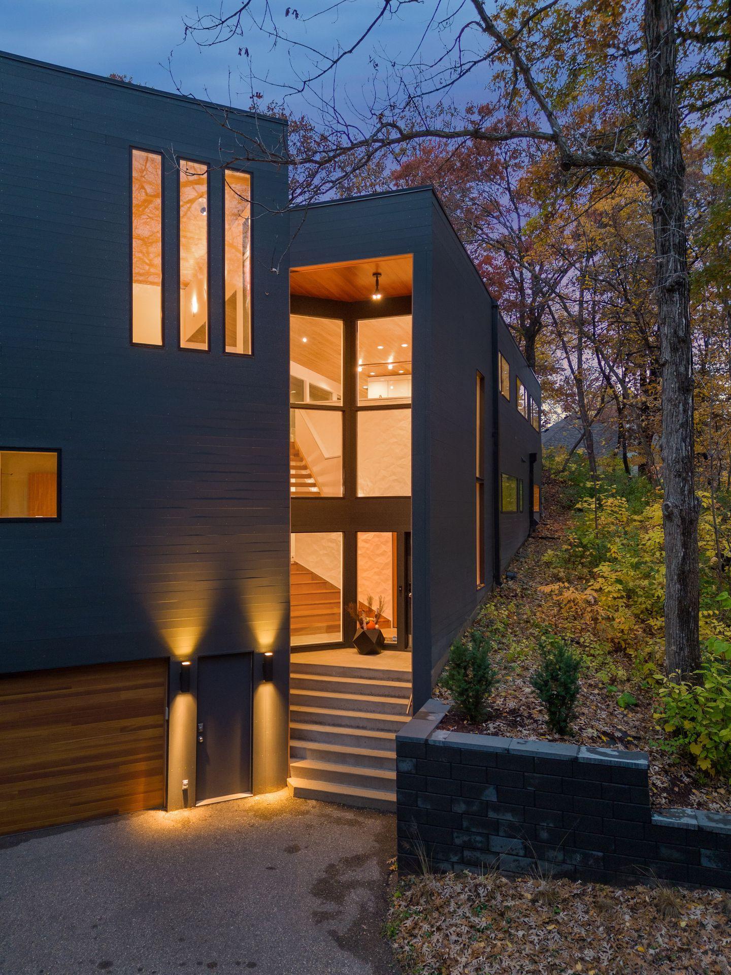 The window placement is masterful in allowing for light and tree views.