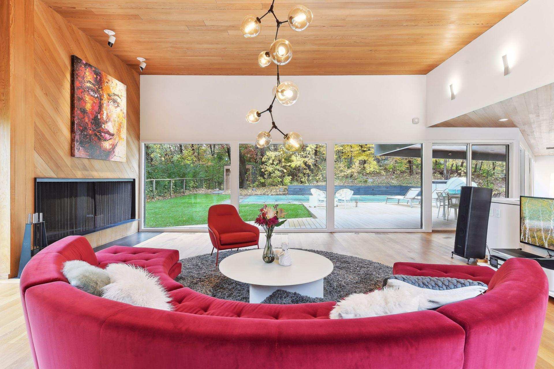 The whole home new 3/4" Solid Hardwood Floor and wood burning fireplace reach to the 12' ceiling and creates a warm and spacious experience. So comfortable.