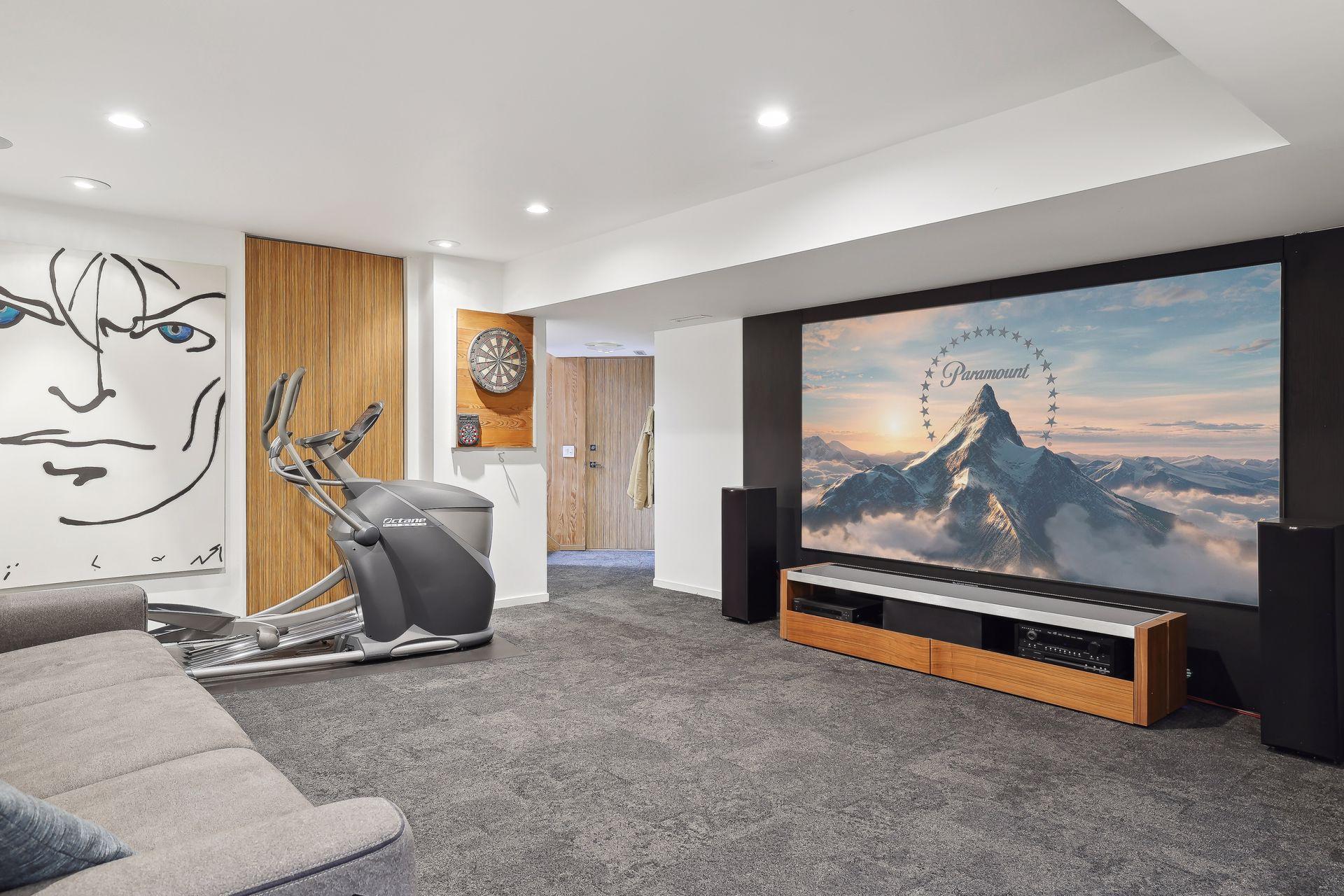 Complete with a movie screen wall for your movie nights
