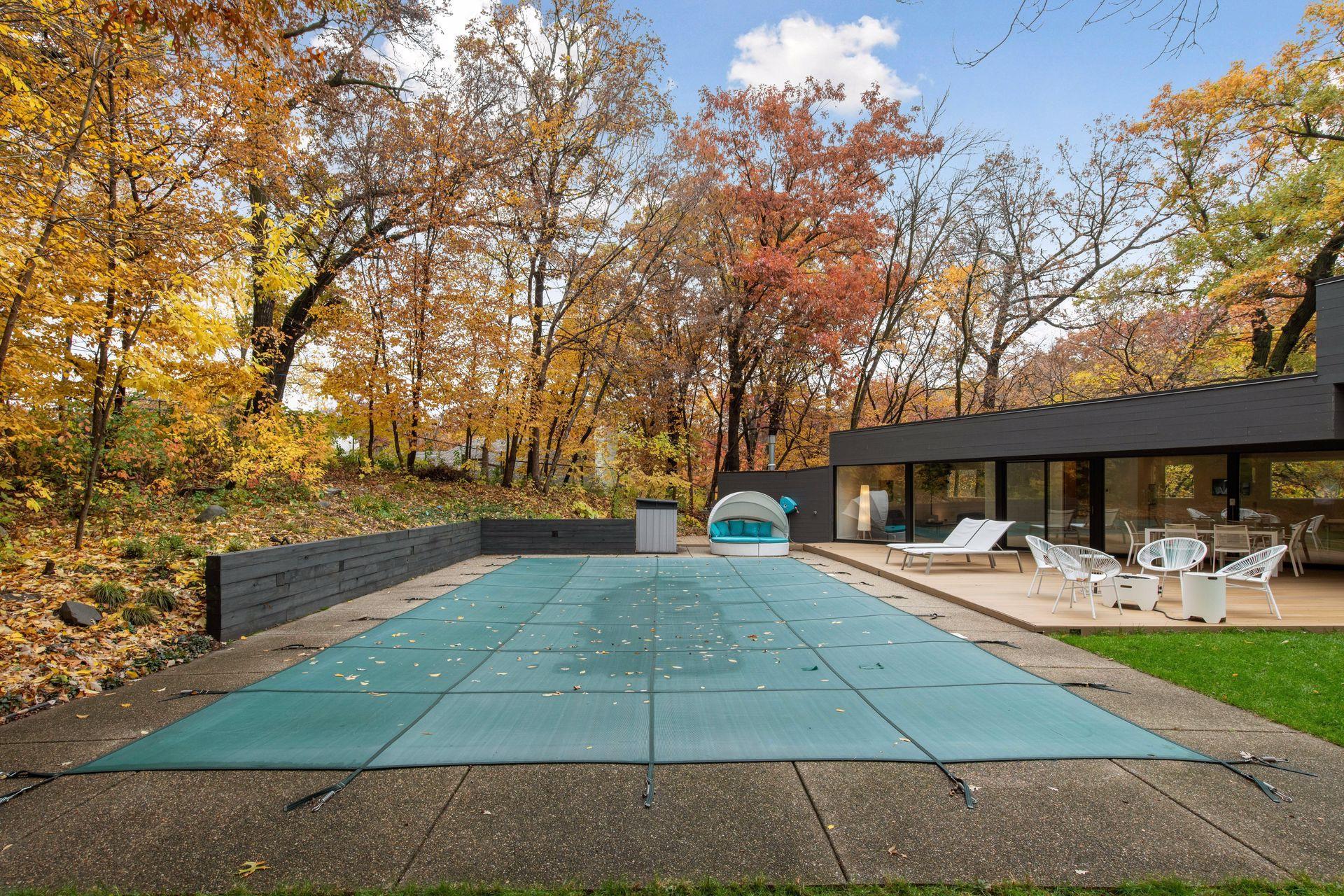 A pool with Salt Water System and LED Lighting and a Removable Solar Pool Cover