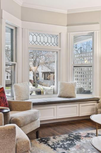 Built-in bay window adds comfortable seating for larger gatherings.