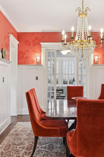 A sunroom is located off the formal dining room.