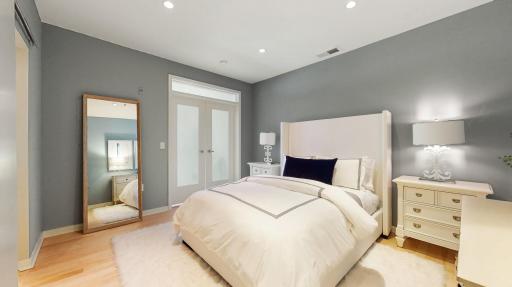 This ample size bedroom can accommodate a variety of furniture arrangements.