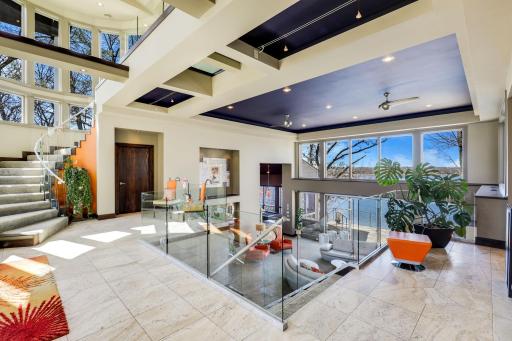 Soaring ceilings, floor to ceiling windows and an open flow create a welcoming and great space for entertaining.