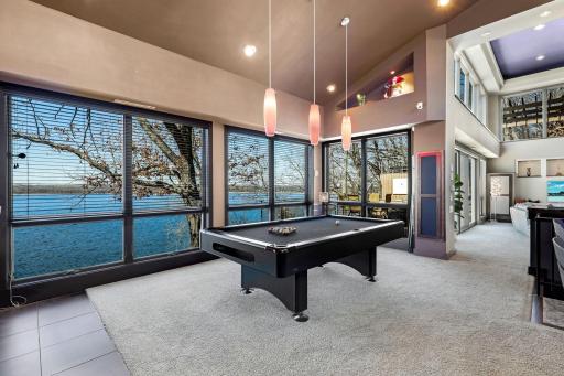 Enjoy the luxurious bar/entertainment area complete with a wine fridge, dishwasher, trash compacter and garbage disposal.
